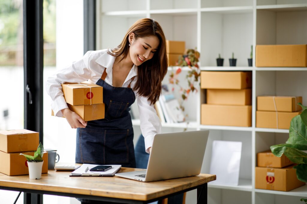 online business owner checking her parcels
