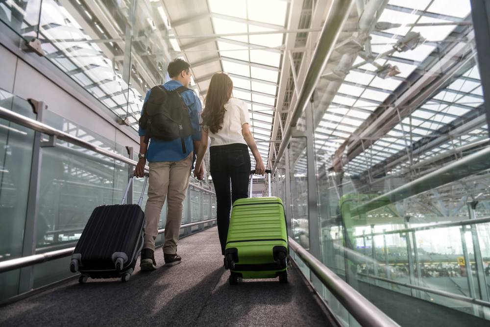 a couple inside an airport